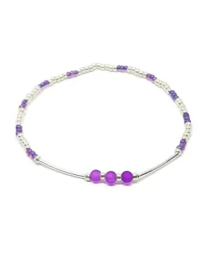 Purple and silver seed bead and sea glass stretch anklet with silver bars.